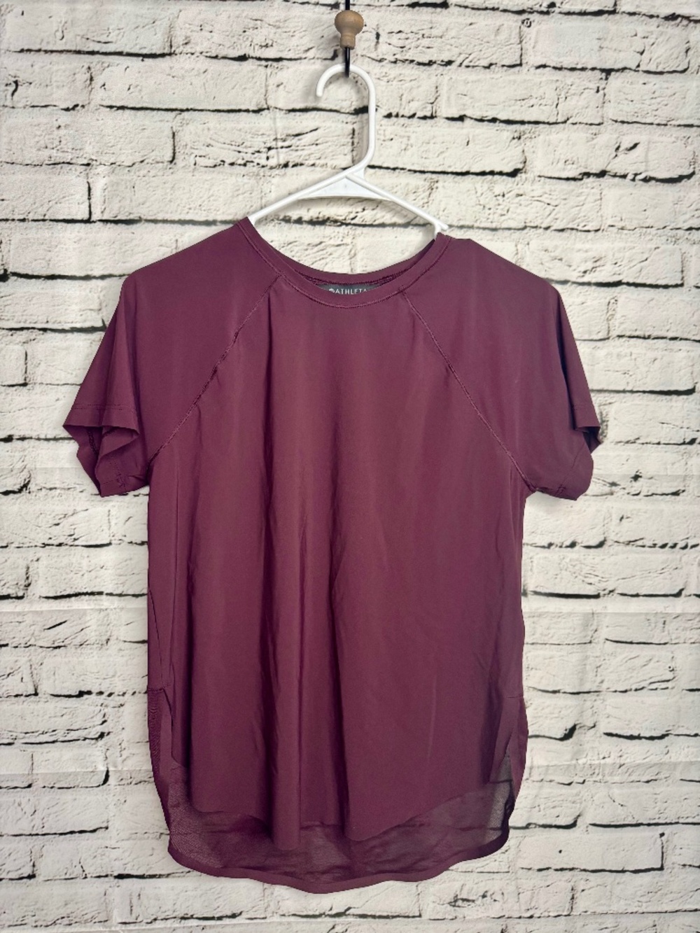 Athleta short-sleeve performance top in a rich berry-plum color